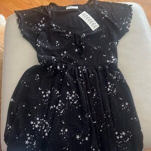 Black jumper dress , cute for back to school. Urban Outfitters.